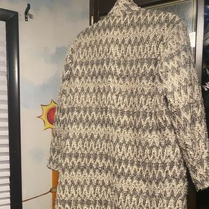 Iro woman’s black and cream coat